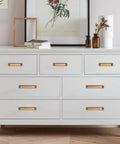 10 Pack 2.5 Inch Antique Brass Cabinet Handles And Cup Pulls Set installed on white dresser drawers