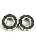 Close-up of two 6202-RS chrome steel deep groove ball bearings from 4 Pack 6202RS Front And Rear Wheel Bearings Set For Coleman Powersports CT200UEX Trail 200cc Baja MB165 MB200 Mini Bikes 6202Z Chrome Steel Deep Groove Ball Bearings With Standard Grease Fill Built For Beefy Performance
