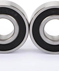 Two 6203-2RS sealed bearings with double seal, 1-9/16 inch outer diameter, 21/32 inch inner diameter, on white background.