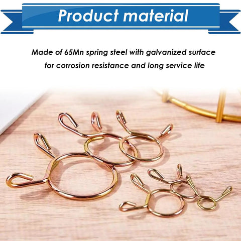 Close-up of 330Pcs Nine Size Spring Hose Clamps Set 5mm To 13mm Galvanized 65Mn Spring Clips on wooden surface