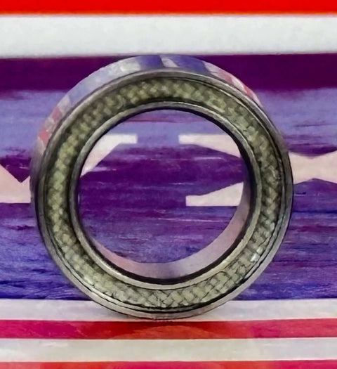 Close-up of 6700-2TS Ball Bearing single row Sealed - PTFE Seals showcasing the PTFE seal and nylon retainer.