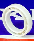 6701 Full Ceramic Bearing 12x18x4mm side view showing zirconium oxide material and PTFE cage design.