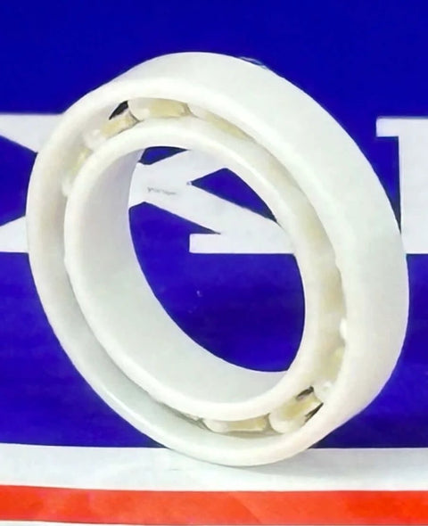 6701 Full Ceramic Bearing 12x18x4mm side view showing zirconium oxide material and PTFE cage design.