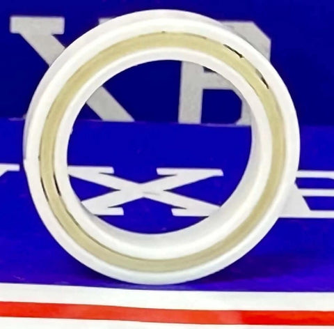 6702 Full Ceramic Bearing 15x21x4mm side view showcasing PTFE cage and zirconia material.