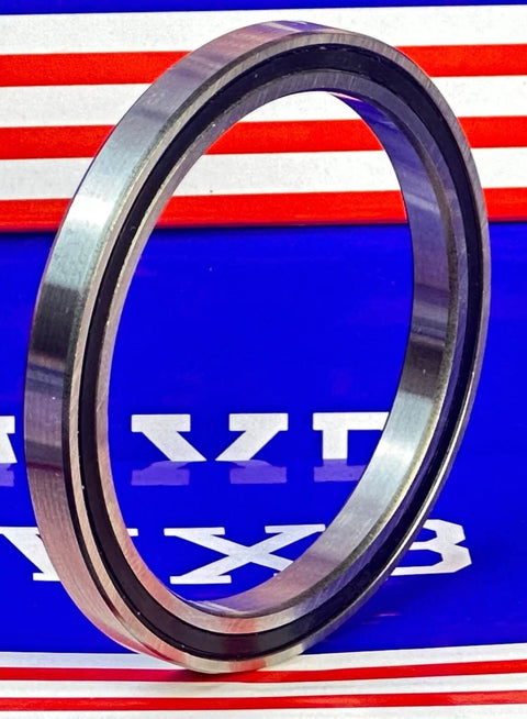 6710-2RS Thin Section Sealed Ball Bearing 50x62x6mm, showing slim profile and double sealed design against a colorful background.