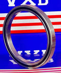 6711-2RS Thin Section Bearing 55x68x7mm side view showcasing chrome steel material and low-profile design.