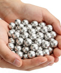 .68 Caliber Aluminum Solid Paintballs 50 x .68 Caliber Self-Defense Balls Compatible, held in hands showcasing shiny finish