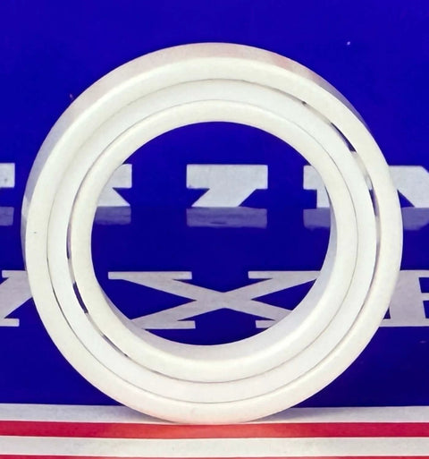 6803 Full Ceramic Bearing 17x26x5mm showing three white Zirconia ceramic rings on a blue background.
