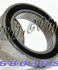 6803RS Bearing - Sealed Bearing 17x26x5mm with rubber seal, shown next to a quarter for size reference.