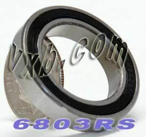 6803RS Bearing - Sealed Bearing 17x26x5mm with rubber seal, shown next to a quarter for size reference.