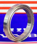 6807ZZ Bearing 35x47x7mm Shielded Ball Bearing shown from side view on blue background.