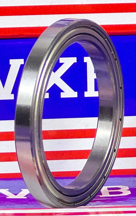 6810ZZ Bearing 50x65x7mm Shielded Ball Bearing side view on a colorful background.