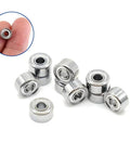 20-Pack 683ZZ Double-Shielded Sealed Ball Bearings 3mm x 8mm x 4mm shown on white background with close-up of single bearing on fingertip.