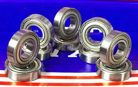 10-Pack 6900ZZ Bearings - 10x22x6mm - Double Shielded Ball Bearings arranged on a reflective surface