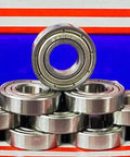10-Pack 6900ZZ Bearings - 10x22x6mm - Double Shielded Ball Bearings stacked with one upright on a colorful background.