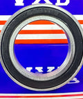 6907-2RS Bearing - 6907RS Ball Bearing with rubber seals, 35mm inner diameter, on display against blue and red background