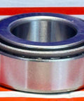 32005X Tapered Roller Bearing 25x47x15mm, chrome steel cone and cup, handles heavy radial and axial loads, displayed on striped backdrop.