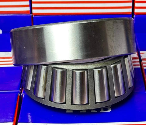 Close-up of 32312 Tapered Roller Wheel Bearing with cone and cup, made from 52100 chrome steel, for radial and axial loads.
