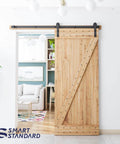 6ft Barn Door Hardware Kit with I shape hanger, installed on wooden barn door, showing heavy duty sliding door track in a modern living room.