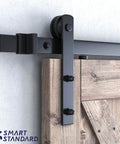 6ft Barn Door Hardware Kit with I shape hanger installed on wooden door panel, heavy duty sliding door track visible