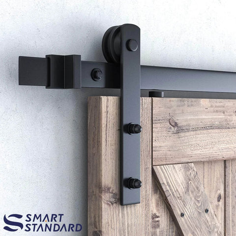 6ft Barn Door Hardware Kit with I shape hanger installed on wooden door panel, heavy duty sliding door track visible