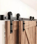 6FT Single Track Bypass Sliding Barn Door Hardware Kit for Double Doors installed view with flat track roller and carbon steel