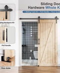 Sliding barn door with hardware, pull handle, and floor guide installed, showcasing 6FT Sliding Barn Door Hardware Track Kit & Handle.