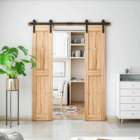6FT Heavy Duty Double Door Sliding Barn Door Hardware Kit with carbon steel track and smooth nylon rollers in living room setup