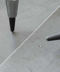 6 Inch Automatic Center Punch With One Handed Spring Impact Chrome Shank And S2 Steel Tip on metal surface close-up