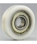 Close-up of 6mm Bore Bearing POM Plastic Track Roller 6x25x7mm showing durable white material and metal inner ring.