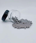 Six Millimeter Stainless Steel Bearing Balls 304 Grade G100 Precision 200 Piece Set, corrosion resistant, spilling from jar