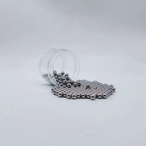 Six Millimeter Stainless Steel Bearing Balls 304 Grade G100 Precision 200 Piece Set for Bearings and Mechanical Projects spilling from container