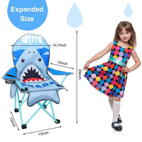 Kids Outdoor Folding Lawn And Camping Chair With Cup Holder And Carrying Bag For Beach And Travel, Sturdy Steel Frame, Water Resistant Oxford Cloth, Cute Shark Pattern displayed next to a child for scale.