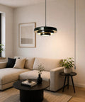 Black Swag Pendant Light Plug in, Mid Century Modern Pendant Lamp with Layered Metal Shade, overhead view in a cozy living room.