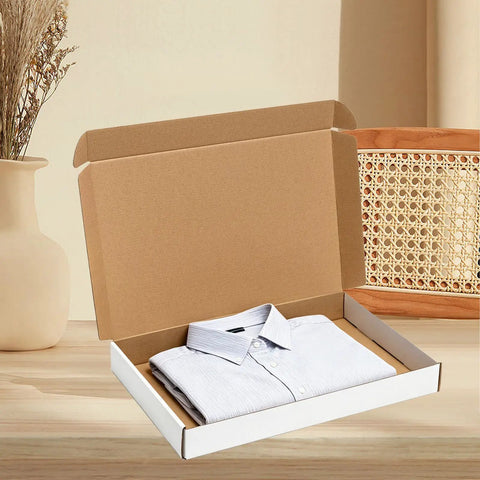 White Corrugated Shipping Boxes 17x11x2 Inches 20 Pack open with shirt inside, ideal for product packaging supplies.