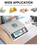 Go To High Precision 30 Kg Digital Counting Scale With 0.5 g Readout For Parts And Coins, on a table with screws