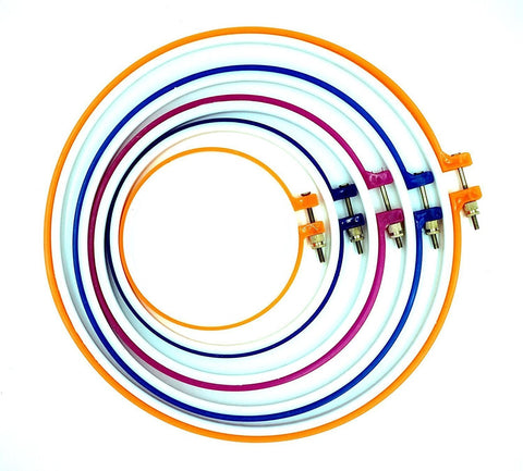 Colorful embroidery hoops from 140 Piece Embroidery Punch Needle Kit Complete Starter Set With Adjustable Needle Tips Magic Embroidery Pen