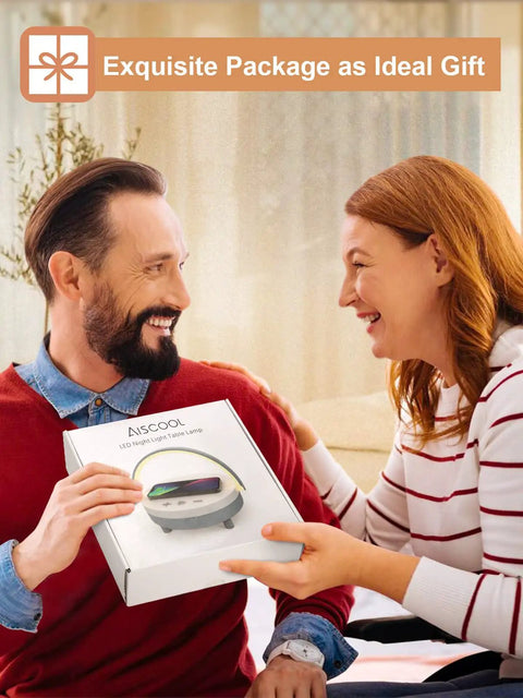 Couple smiling while holding 4 In 1 LED Night Light Bluetooth Speaker Wireless Charger Phone Holder Touch Bedside Lamp For Bedroom Or Office, Super Handy Desk Lamp With Mood Lighting, Ideal Gift For Men Women Teens Boys Girls in a gift box.