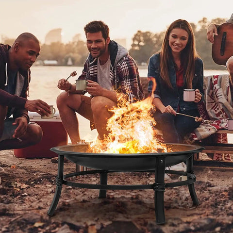Group enjoying 26 Inch Outdoor Wood Burning Fire Pit Heavy Duty Steel Bonfire Bowl With Spark Screen Log Grate And Poker For Patio Backyard Camping Deck And Picnic Great For Family Gatherings And Chill Sessions