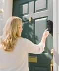 Woman using No Drill Adhesive Doorbell Mount For All New Video Doorbell Camera Second Generation Easy To Install Mounting Bracket