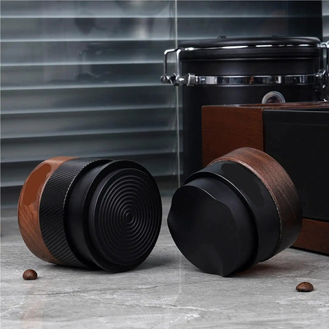 Top Shelf Wood Tamper For Espresso Makers Featuring Spring Loaded Calibration For 51mm 54mm And 58mm Portafilters, showing two tampers with walnut and black finishes.