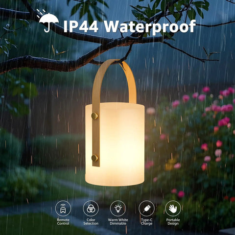 Cordless LED Lantern Table Lamp with Remote hanging in rain, IP44 shower safe and waterproof, ideal for patio and camping vibe