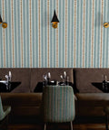 Custom Printed Vinyl Wall Covering With A Subtle Leather Look And Modern Stripe Pattern Great For Commercial Spots Or Home Hangouts, seen in a restaurant.