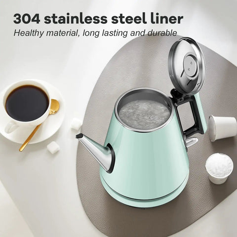 0.9L Electric Kettle With 304 Stainless Steel Interior, 1000W Fast Boil In 4 To 6 Minutes, Vintage Compact Design on table
