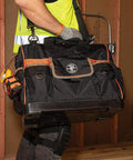 Tradesman Pro Wide Open Tool Bag With 1680 Ballistic Weave Molded Bottom in construction site setting