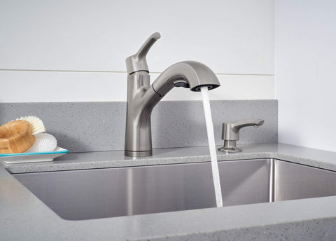 Parkwood Single Handle Pullout Kitchen Faucet With Dual Sprayer Aerated Stream Or Spray Stainless Finish ADA Compliant 120 Degree Swivel Spout Fits Single Hole Install Optional Deck Plate RP100681SS in use pouring water into sink