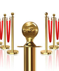 Gold Stanchions With Red Velvet Ropes, 6 Posts And 4 Five Foot Ropes, Crowd Control Barriers For Parties Or Events, Velvet Rope Poles For Red Carpet Vibe And Easy Setup; gold stanchions set with red ropes on white background, front view