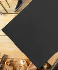 Get The Ultimate Multipurpose Sandpaper Set With 10 Sheets Of Assorted Grits on wooden workbench with tools and shavings.