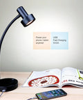 Dimmable LED Desk Lamp with USB Charging Port 5V 2A Full Range Dimming Flexible Gooseneck in Vintage Black on desk next to phone