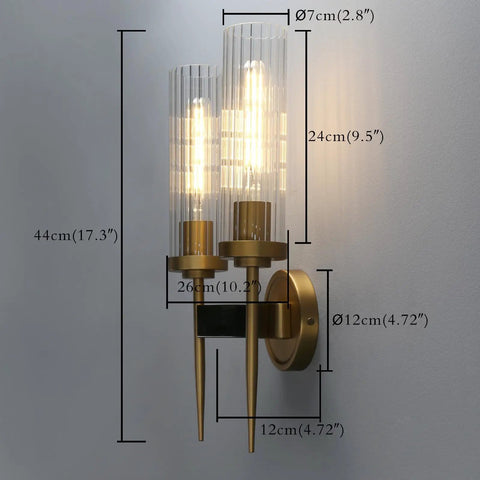 Two-Light Gold Brass Wall Sconces With 2.8 Inch Cylindrical Clear Glass Shades, Dimmable, E26 Base Compatible shown installed